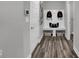 Mudroom with a built-in bench, storage baskets, wall hooks, and a control panel at 19341 Sumrall Pl, Westfield, IN 46074