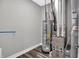 Utility room featuring a modern water heater, furnace and painted gray walls at 19341 Sumrall Pl, Westfield, IN 46074