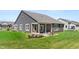 This home features a covered patio with nice backyard for outdoor enjoyment at 19357 Sumrall Pl, Westfield, IN 46074