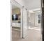 Cozy bedroom featuring a sliding barn door, a TV and a neutral decor scheme at 19357 Sumrall Pl, Westfield, IN 46074