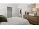 Inviting bedroom with a neutral color scheme, stylish dresser, and sliding closet doors at 19357 Sumrall Pl, Westfield, IN 46074
