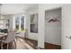 Bright dining room featuring large windows, modern decor, and a walk-in closet at 19357 Sumrall Pl, Westfield, IN 46074