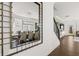Reflected dining room showcases decor with table, chairs, and view of adjacent living spaces at 19357 Sumrall Pl, Westfield, IN 46074