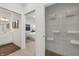 Hallway featuring access to the bathroom, a bedroom, and a walk-in closet at 19357 Sumrall Pl, Westfield, IN 46074