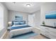 Serene bedroom with soft lighting, calming color palette, and comfortable furnishings for relaxation at 2005 E Maryland St, Indianapolis, IN 46201