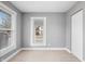 Bedroom with neutral carpet, gray walls, and white closet at 2005 E Maryland St, Indianapolis, IN 46201