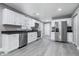 Modern kitchen equipped with stainless steel appliances, sleek countertops, and ample cabinet storage at 2005 E Maryland St, Indianapolis, IN 46201
