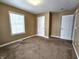 Bedroom with neutral walls and carpet at 2103 Twelve Oaks Dr, Shelbyville, IN 46176