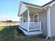 Gray house exterior with white trim and vinyl siding at 2103 Twelve Oaks Dr, Shelbyville, IN 46176