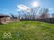 Large backyard with grassy lawn and deck with pergola at 3050 N County Road 950 E, Brownsburg, IN 46112