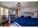 Bedroom with silver bed frame, dresser, and ceiling fan at 320 Peach Tree Ln, Indianapolis, IN 46219