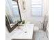 Clean bathroom with marble flooring and modern vanity at 3501 Caroline Ave, Indianapolis, IN 46218