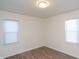 Spacious bedroom with wood flooring and neutral walls at 3501 Caroline Ave, Indianapolis, IN 46218