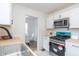 Modern kitchen with stainless steel appliances and wood countertops at 3501 Caroline Ave, Indianapolis, IN 46218