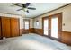 Spacious bedroom with double doors leading to deck at 3504 Raible Ave, Anderson, IN 46011