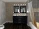 Double vanity bathroom with dark wood cabinets at 5005 E 64Th St, Indianapolis, IN 46220