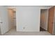 Bedroom with carpet, neutral walls, and two closets with wood shelving at 5325 Oliver Ave, Indianapolis, IN 46241