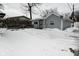 Gray exterior of small house covered in snow at 5325 Oliver Ave, Indianapolis, IN 46241