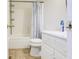 Bathroom with shower/tub combo, white vanity, and tile floor at 5334 Thrasher Dr, Indianapolis, IN 46254