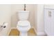 Clean bathroom with white toilet and vanity, tile floor at 5334 Thrasher Dr, Indianapolis, IN 46254
