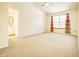 Spacious bedroom with carpet flooring and ensuite bathroom access at 5334 Thrasher Dr, Indianapolis, IN 46254