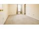 Well-lit bedroom with carpet flooring and a large window at 5334 Thrasher Dr, Indianapolis, IN 46254