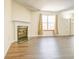 Living room fireplace with marble surround at 5334 Thrasher Dr, Indianapolis, IN 46254