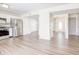 Open concept kitchen with stainless steel appliances and views into the dining and entry areas at 5334 Thrasher Dr, Indianapolis, IN 46254