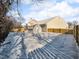 Snowy backyard with shed and wooden fence at 5705 Tansy Ct, Indianapolis, IN 46203