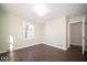 Bright bedroom with hardwood floors and ample closet space at 5738 Norwaldo Ave, Indianapolis, IN 46220