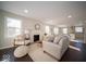 Spacious living room with fireplace and hardwood floors at 5738 Norwaldo Ave, Indianapolis, IN 46220