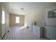 Laundry room with linoleum floor and access to exterior at 67 W Brookville Rd, Fountaintown, IN 46130