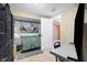 Small basement bedroom with twin bed and dresser at 714 Berkley Rd, Indianapolis, IN 46208