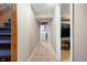Basement hallway with tiled floor and laundry access at 714 Berkley Rd, Indianapolis, IN 46208