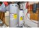 Basement with two water heaters and plumbing at 714 Berkley Rd, Indianapolis, IN 46208