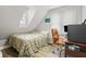 Small bedroom with a single bed and home office setup at 714 Berkley Rd, Indianapolis, IN 46208
