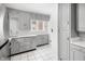 Bright eat-in kitchen with grey cabinets and quartz countertops at 714 Berkley Rd, Indianapolis, IN 46208
