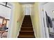 Staircase leading to the upper level of the home at 714 Berkley Rd, Indianapolis, IN 46208