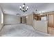 Spacious living room with carpeting and kitchen views at 811 Buffalo Run Way, Indianapolis, IN 46227