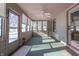 Sunroom featuring a ceiling fan and ample natural light at 819 Cypress S, Greenwood, IN 46143