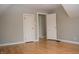 Bedroom with hardwood floors, gray walls and closet at 906 Raible Ave, Anderson, IN 46011