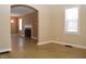 Hardwood floor dining room with view into living room at 906 Raible Ave, Anderson, IN 46011
