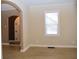 View of dining room with hardwood floors and window at 906 Raible Ave, Anderson, IN 46011