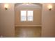 Dining room with hardwood floors and two windows at 906 Raible Ave, Anderson, IN 46011