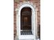 Arched front door entryway with patterned tile floor at 906 Raible Ave, Anderson, IN 46011