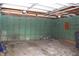 Empty garage with painted walls and concrete floor at 906 Raible Ave, Anderson, IN 46011
