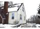 Yellow siding on the side of the house in winter at 906 Raible Ave, Anderson, IN 46011
