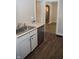 Kitchen with stainless steel dishwasher and view into living room at 906 Raible Ave, Anderson, IN 46011