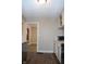 Kitchen features white cabinets, new flooring and microwave at 906 Raible Ave, Anderson, IN 46011