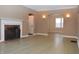 Bright living room with hardwood floors and fireplace at 906 Raible Ave, Anderson, IN 46011